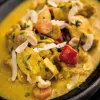 Curry de pollo con coco Nightingale y cacahuetes 