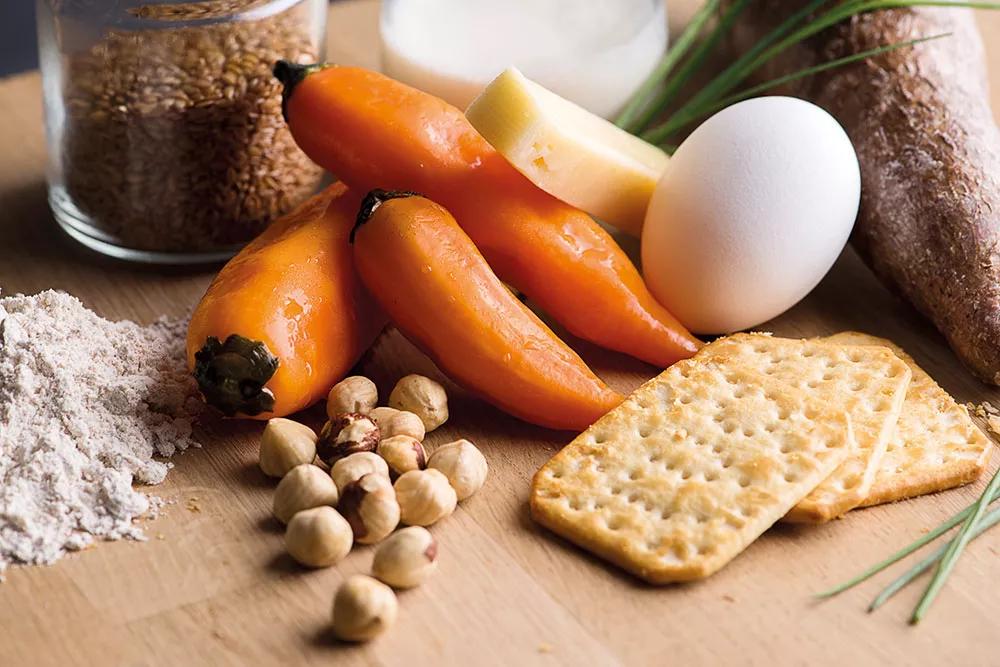 Ñoquis de yuca con cannasalsa huancaína, rúcula y avellanas 